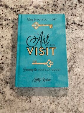 The Art of the Visit Teal Decorative Book by Kathy Bertone